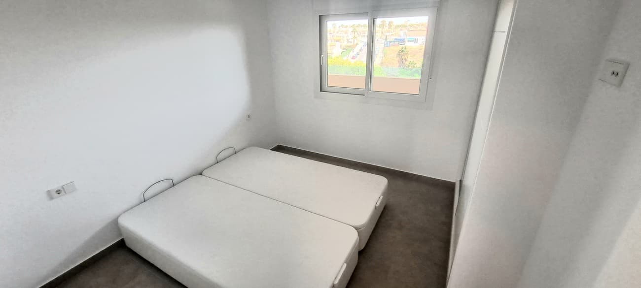 Tussenverdieping Appartement met 2 slaapkamers in Playa Flamenca - 17